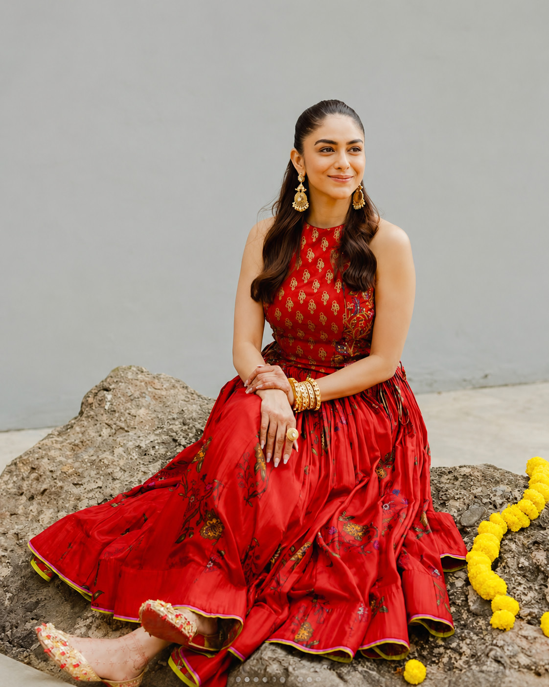 Mrunal Thakur in a red floral lehenga