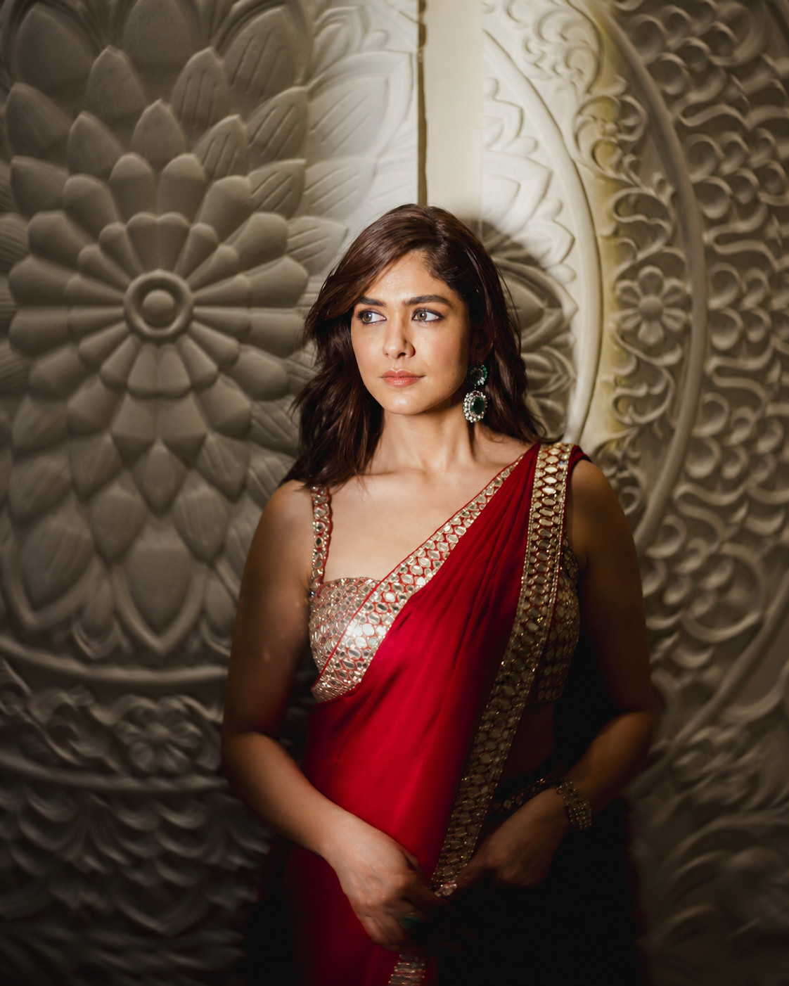Mrunal Thakur in a red saree