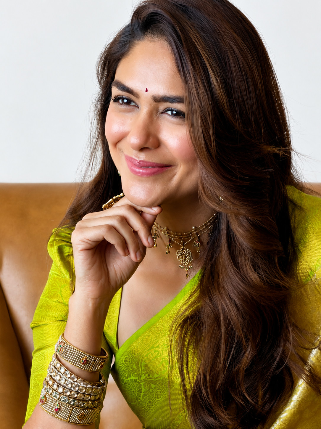 Mrunal Thakur in a green saree